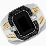 top angle of men’s gold ring with black onyx and diamond detailing