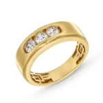 alt="yellow gold diamond band for men with three brilliant-cut diamonds"